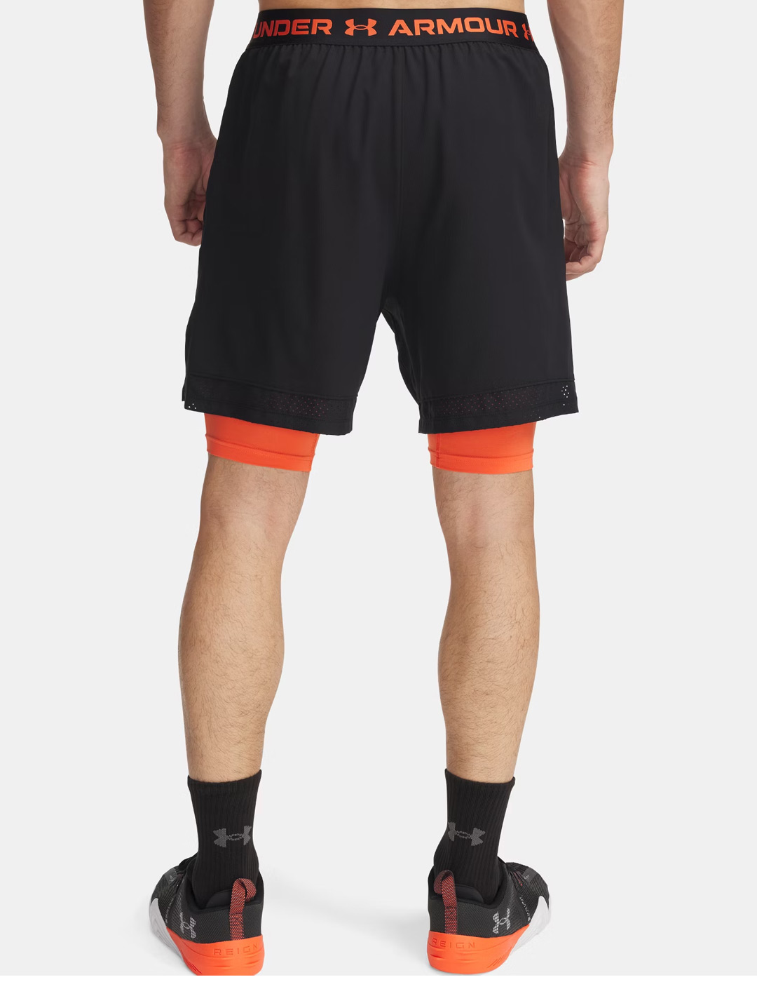 short  trainning under armour 2 en 1 , negro/naranja
